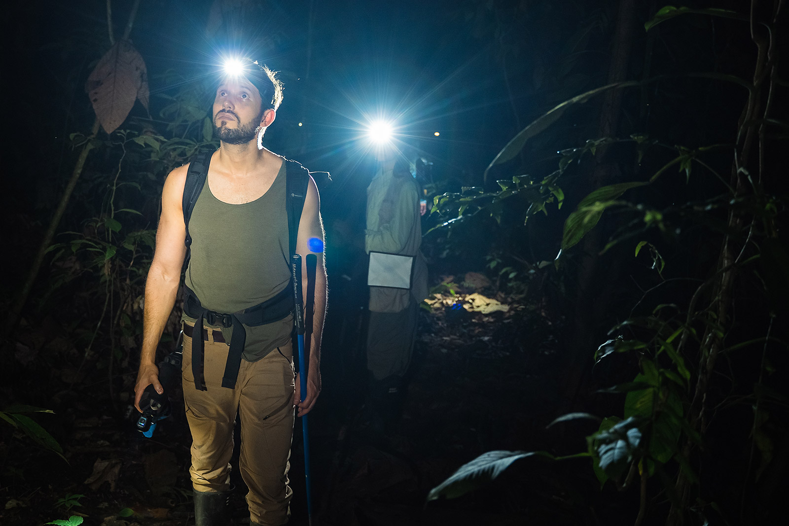 Biologist Alejandro Arteaga explores the rainforest during an expedition for the Reptiles of Ecuador book