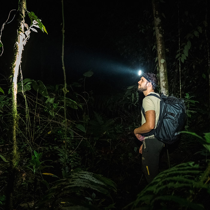 Alejandro Arteaga scanning vegetation during a cloud forest expedition